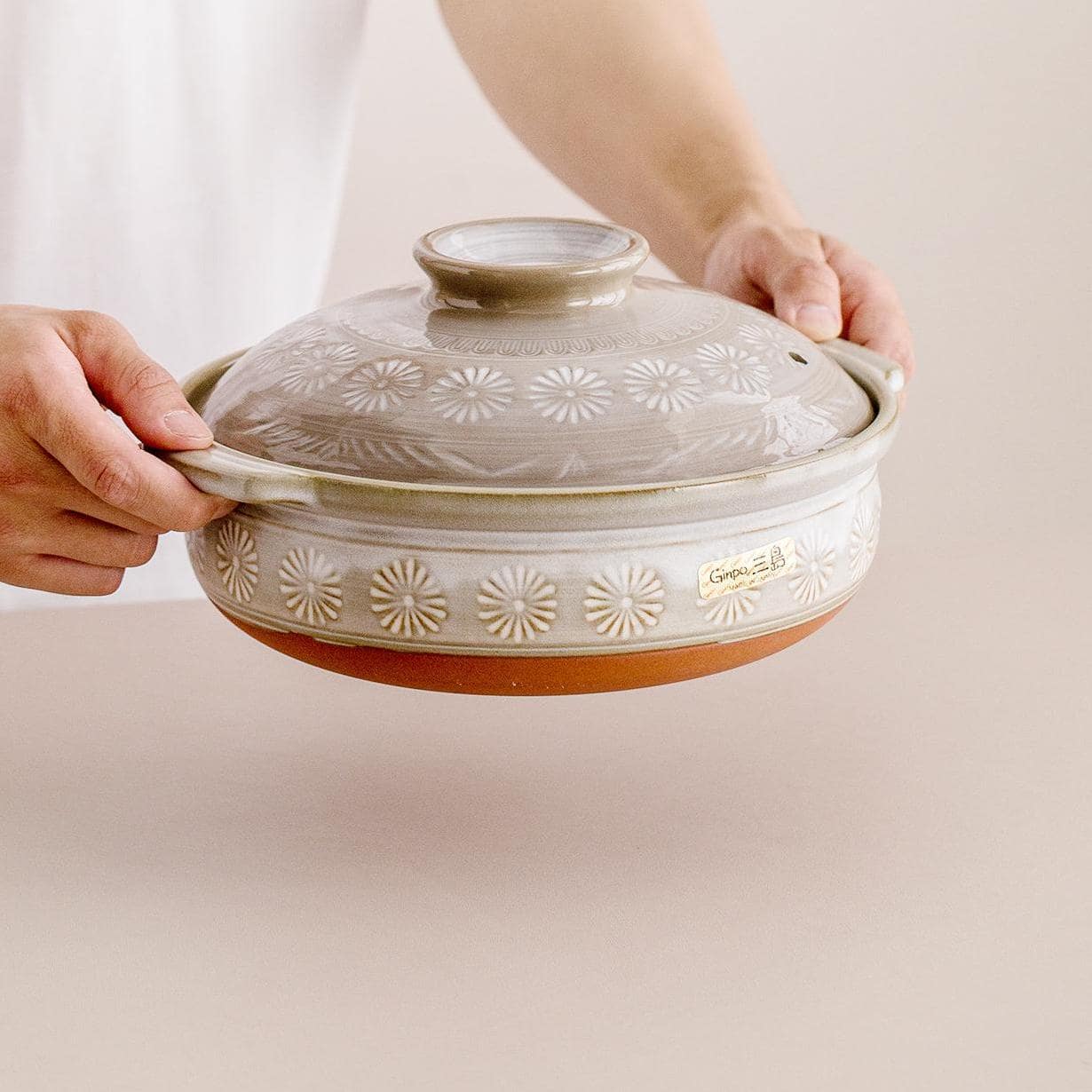 Handcrafted eco-friendly ceramic pot with vented lid