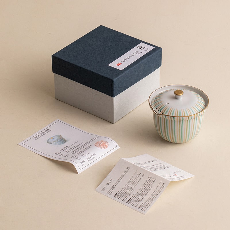 Gift box of Nishikawa Sadazaburo Kiyomizu-yaki tea set with documents.