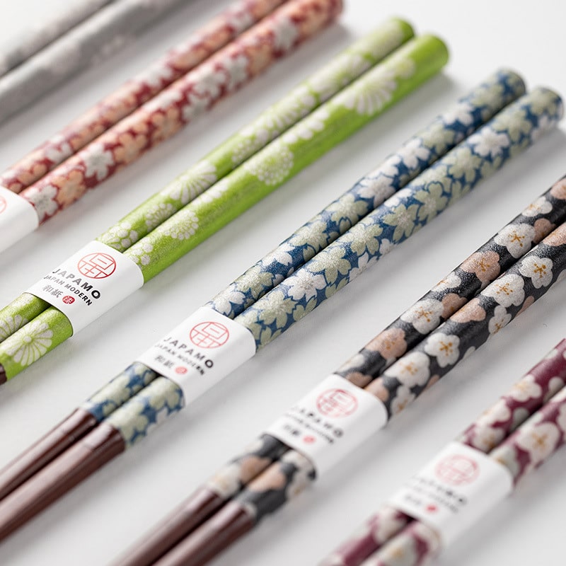 Matching couple chopsticks featuring cherry blossom patterns