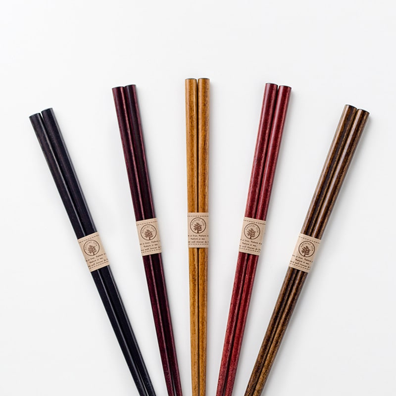 Non-slip solid wood chopsticks in natural tones.