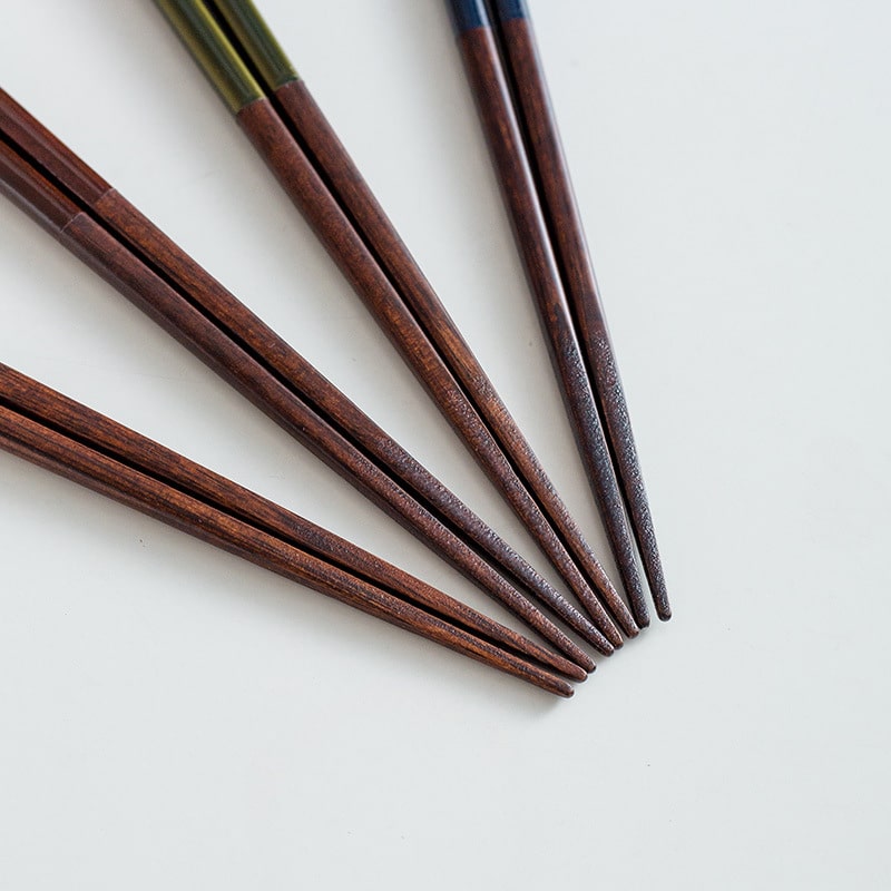 Elegant dining setup with wooden chopsticks