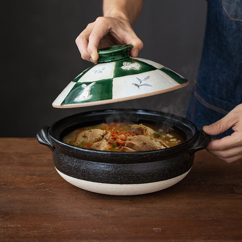 High-temperature resistant Japanese clay pot on wooden table