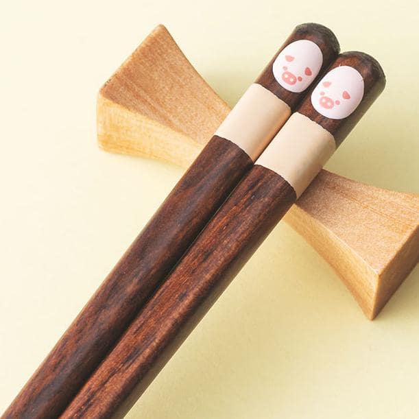 Durable and lightweight animal-themed chopsticks displayed on a plate