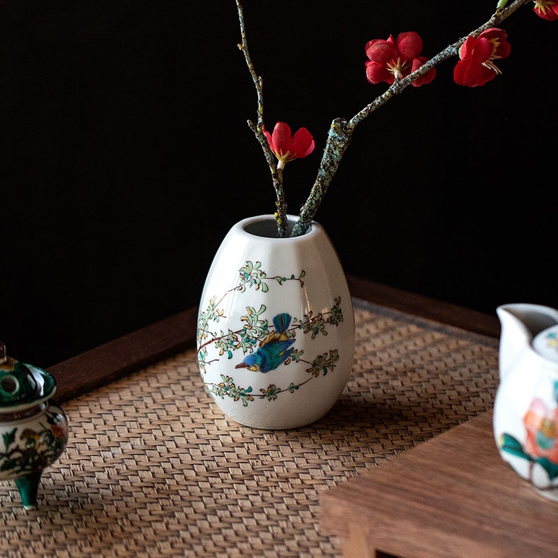 Elegant Japanese-style vase with bird and flower artwork for tabletop décor