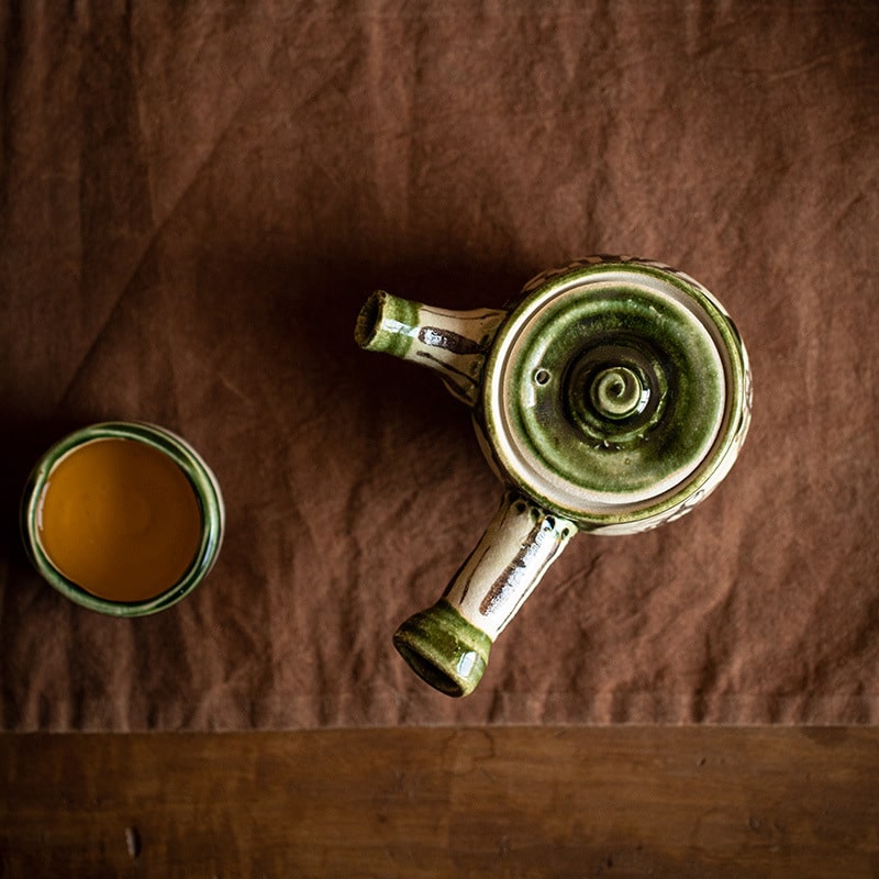 Top-down view of Japanese handmade ceramic Kyusu kettle.