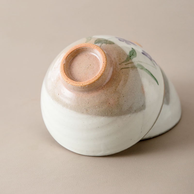 Five floral ceramic bowls displayed with wooden box packaging