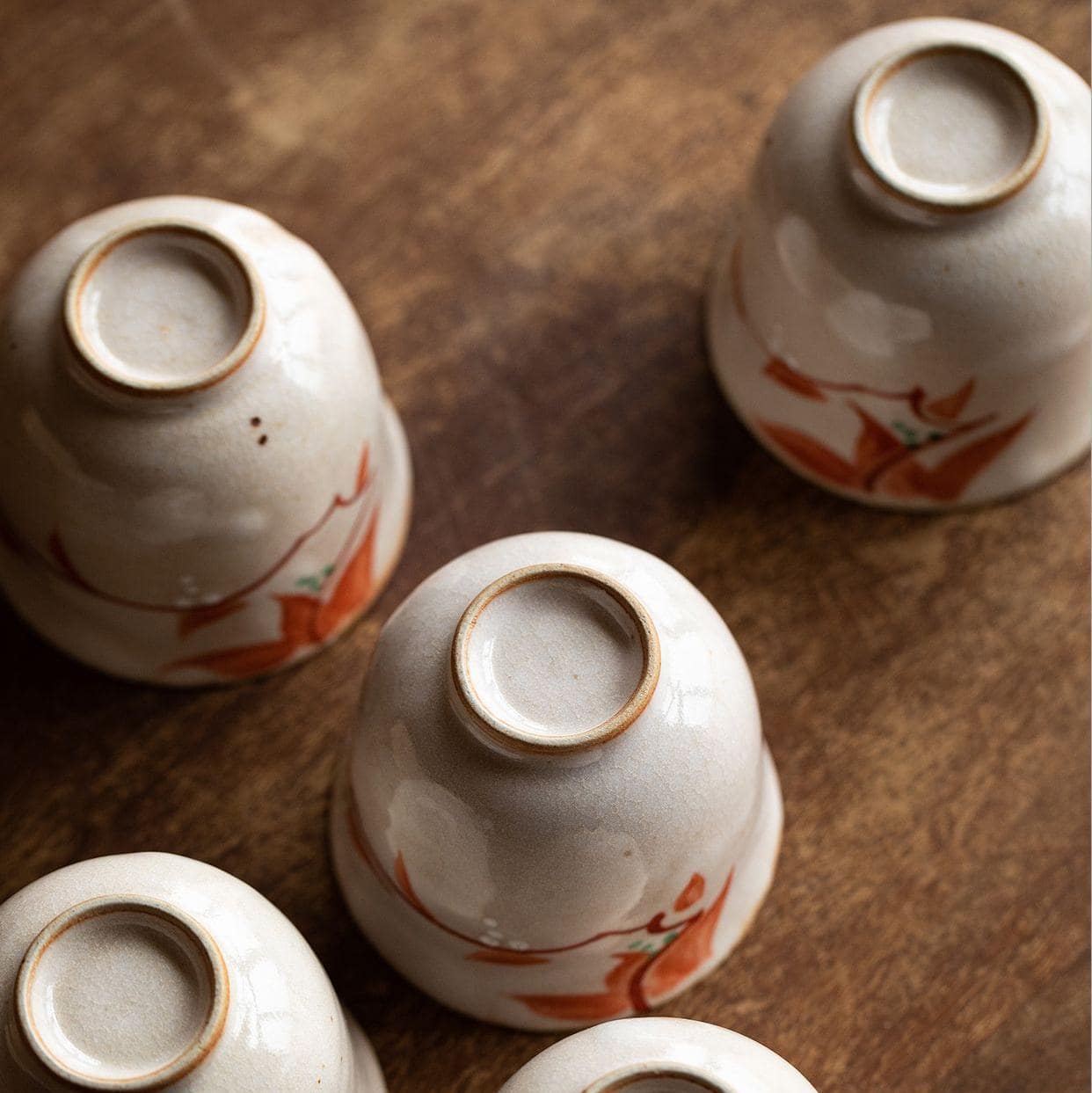 Hand-painted Japanese ceramic cups in an elegant wooden box