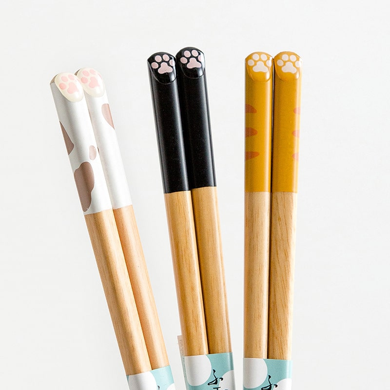 Adorable cat paw wooden chopsticks in white, black, and orange