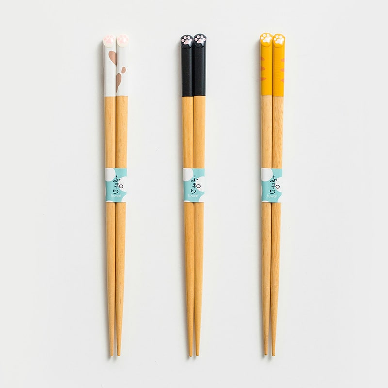 Close-up of cute cat paw-themed reusable chopsticks