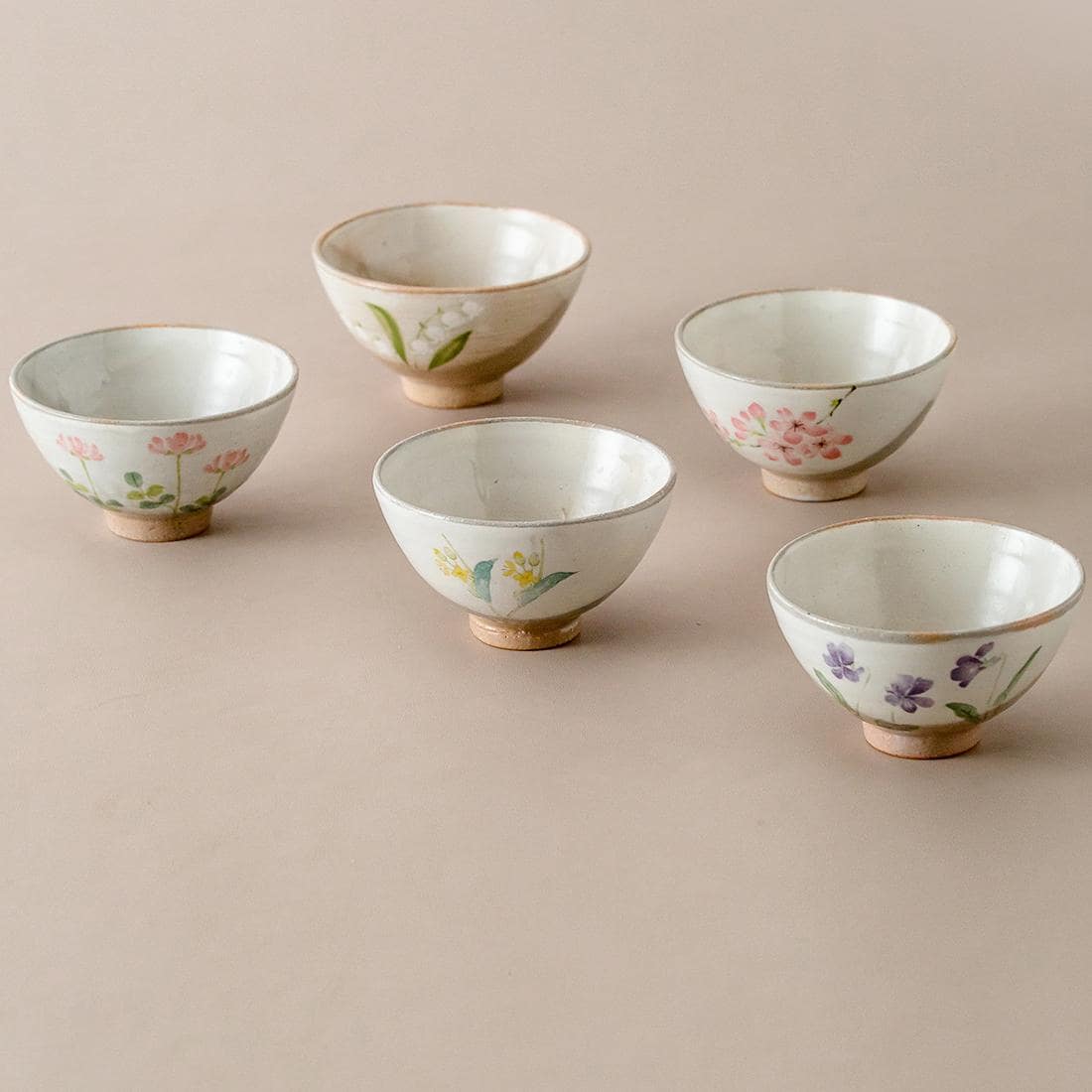 Close-up of handcrafted ceramic bowl with floral motif