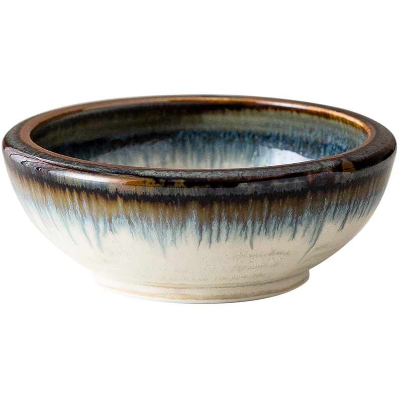 Modern ceramic deep bowl on display for dining