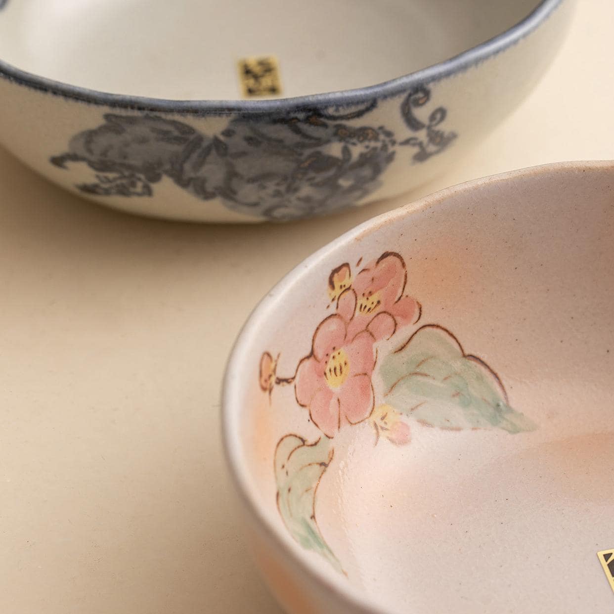 Hand-painted ceramic bowls with delicate floral patterns