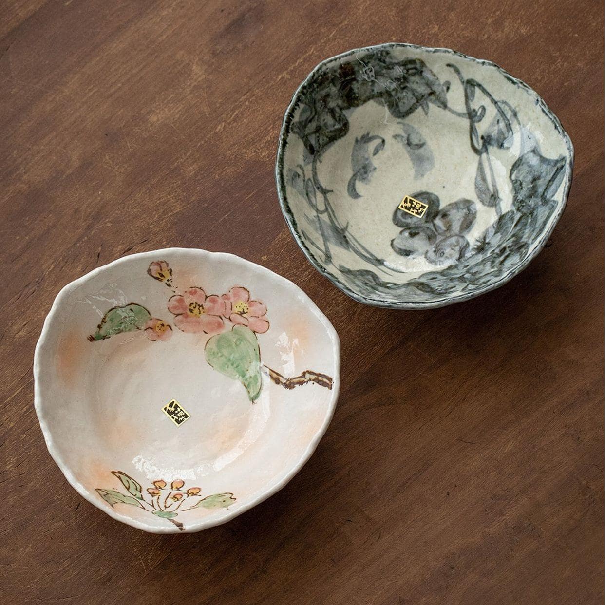 Set of artisan floral bowls on a rustic table