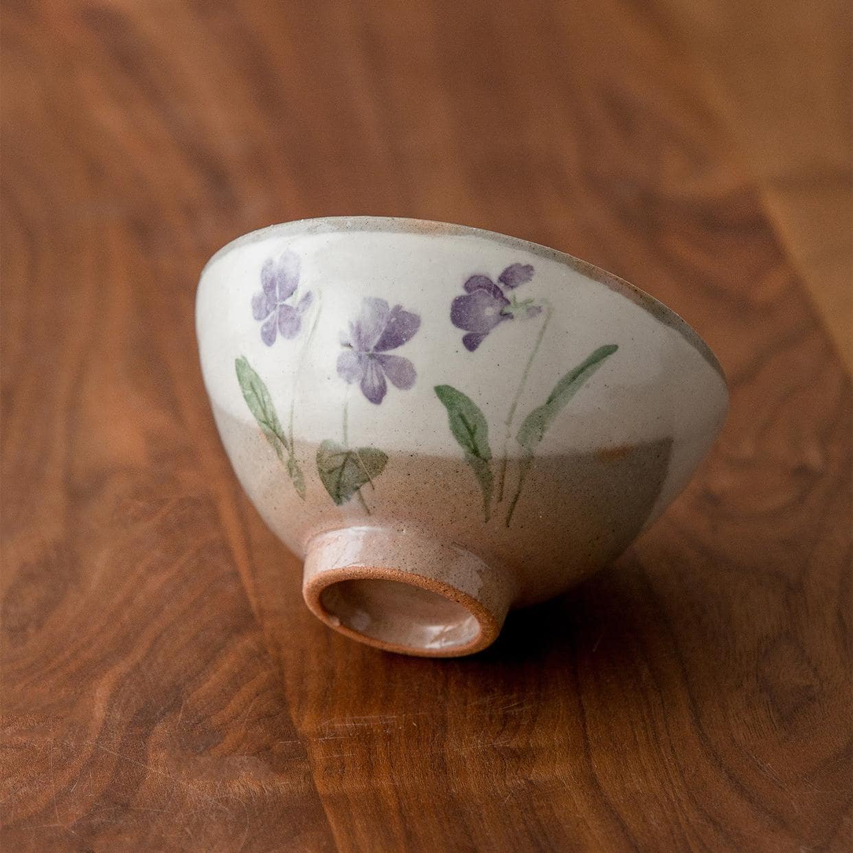 Side view of ceramic bowls with delicate glaze finish