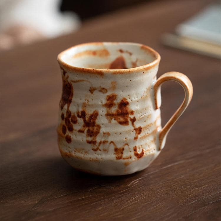 Close-up of floral-patterned ceramic coffee mug