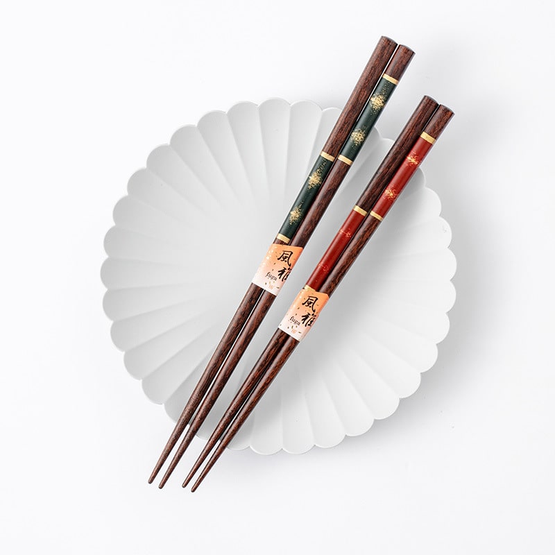 Elegant chopstick set displayed on modern tableware