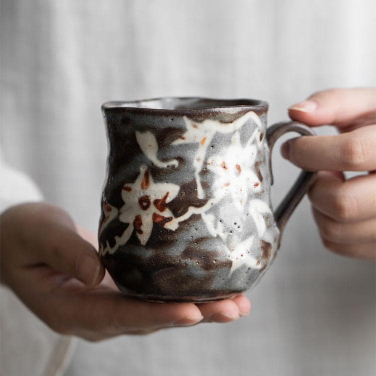 Nature-inspired ceramic cup on a wooden table