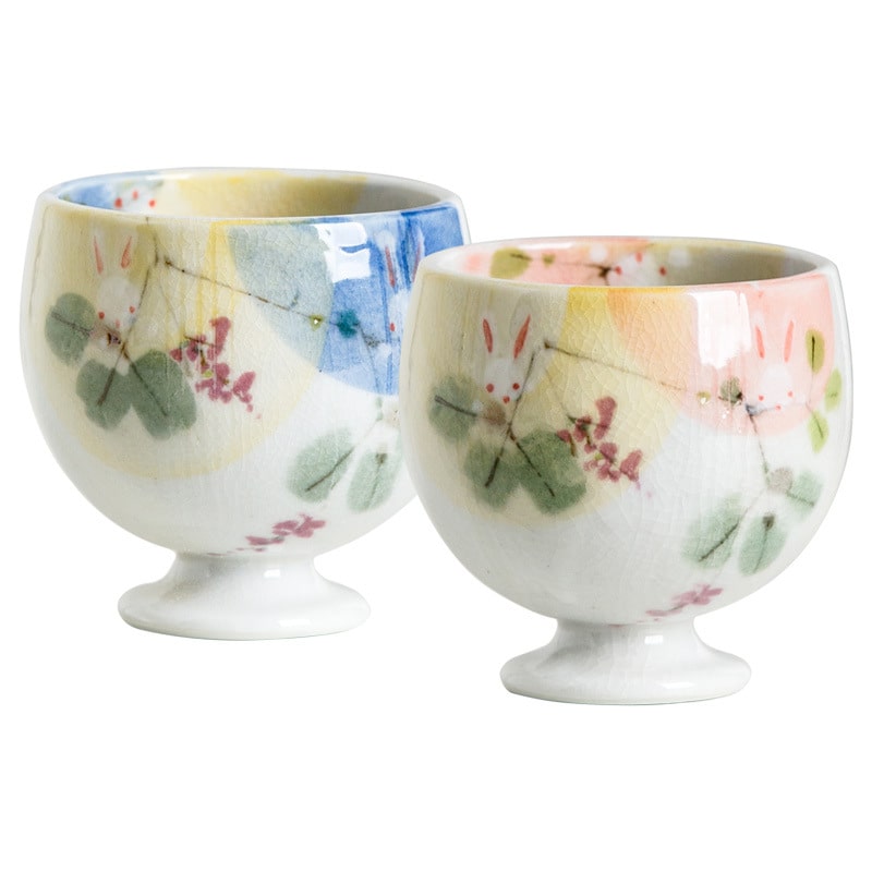 Set of hand-painted ceramic cups with unique designs