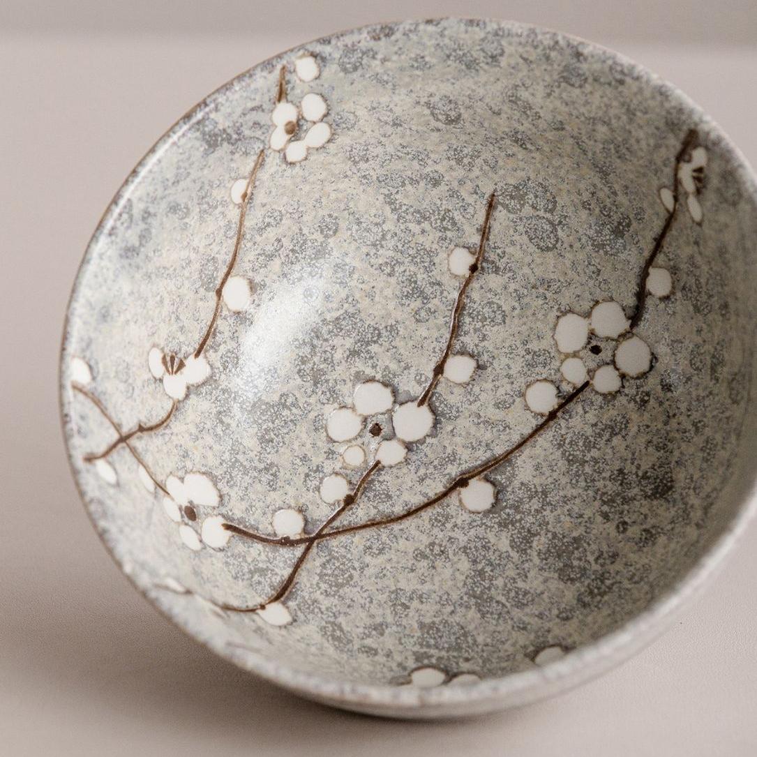 Close-up of artisan bowl bottom stamped with Japanese design