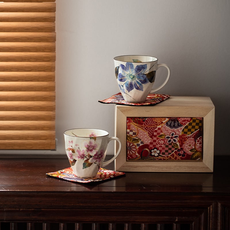 Porcelain tea mugs with vibrant floral patterns