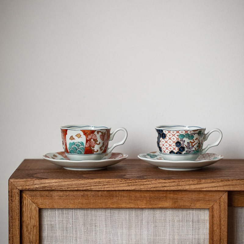 Decorative porcelain tea set with floral and geometric patterns