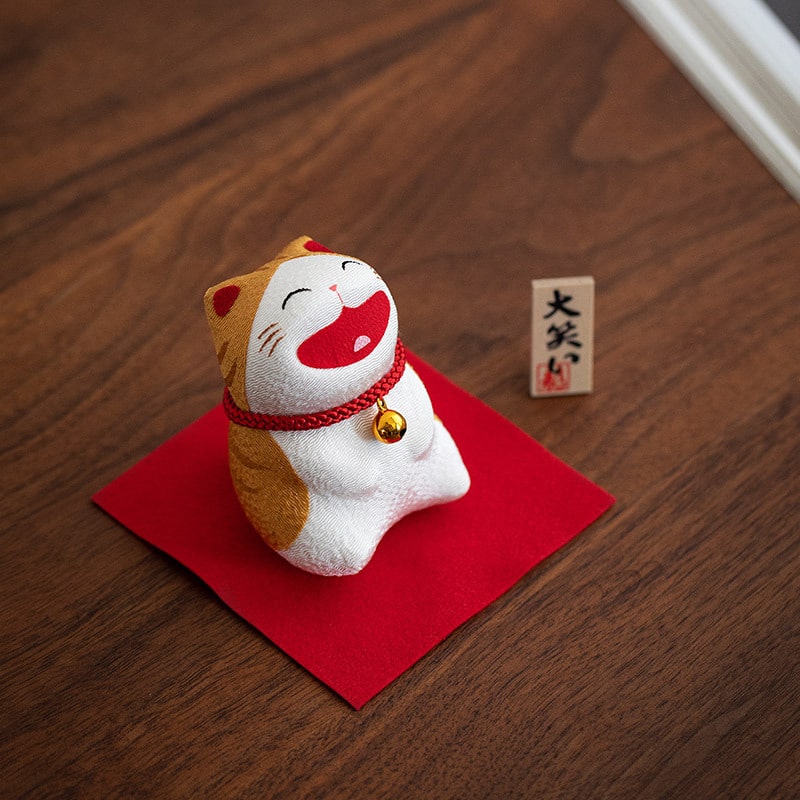 Lucky cat desk decoration bringing good luck and joy