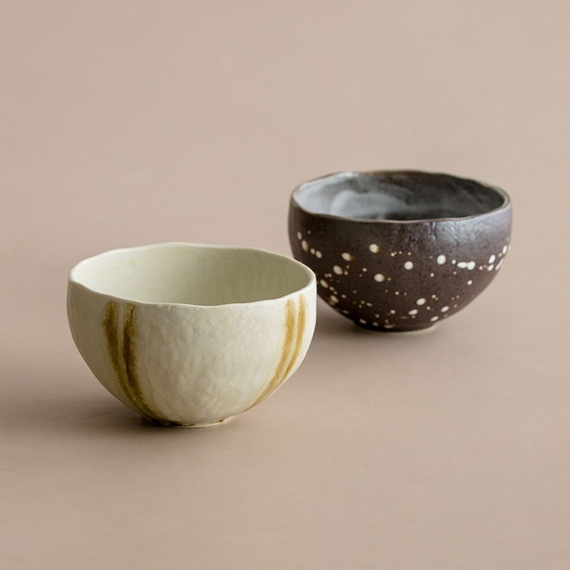 Organic texture ceramic bowl for elegant dining.