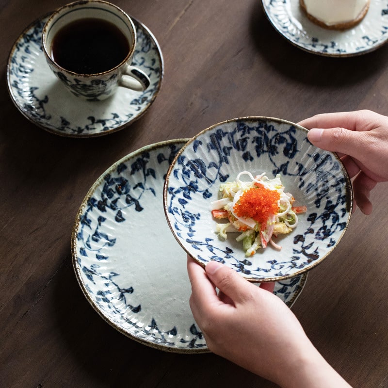 Handcrafted Japanese ceramic cup and saucer with a vintage design