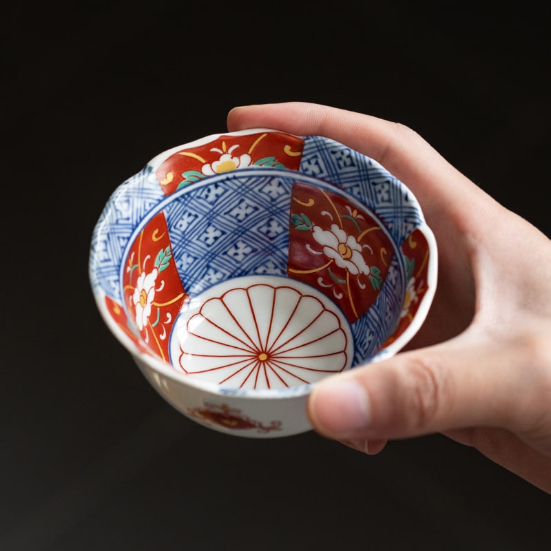 Close-up of a red and blue patterned Hasami-yaki bowl