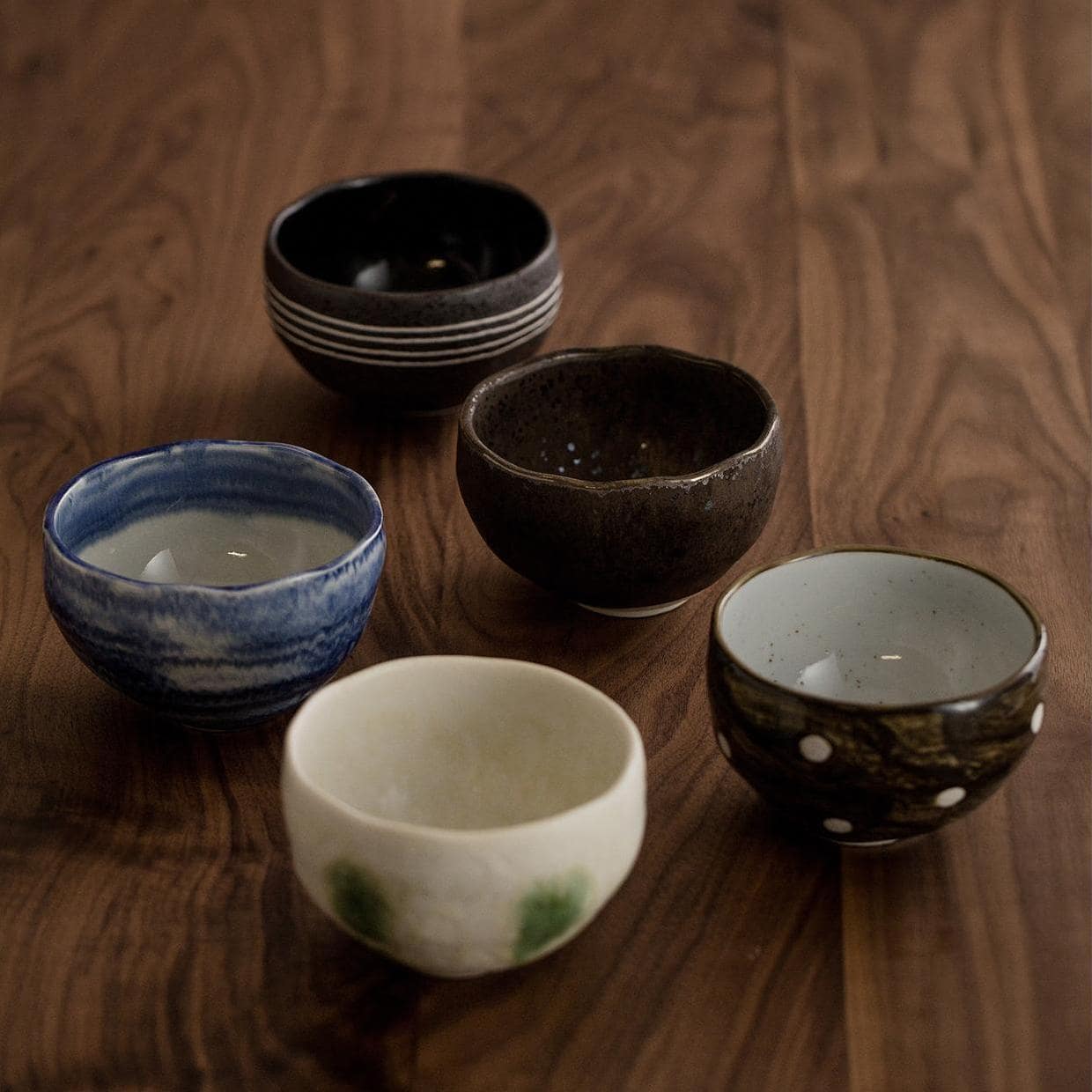 Artisan ceramic bowls with earthy and ocean-inspired tones