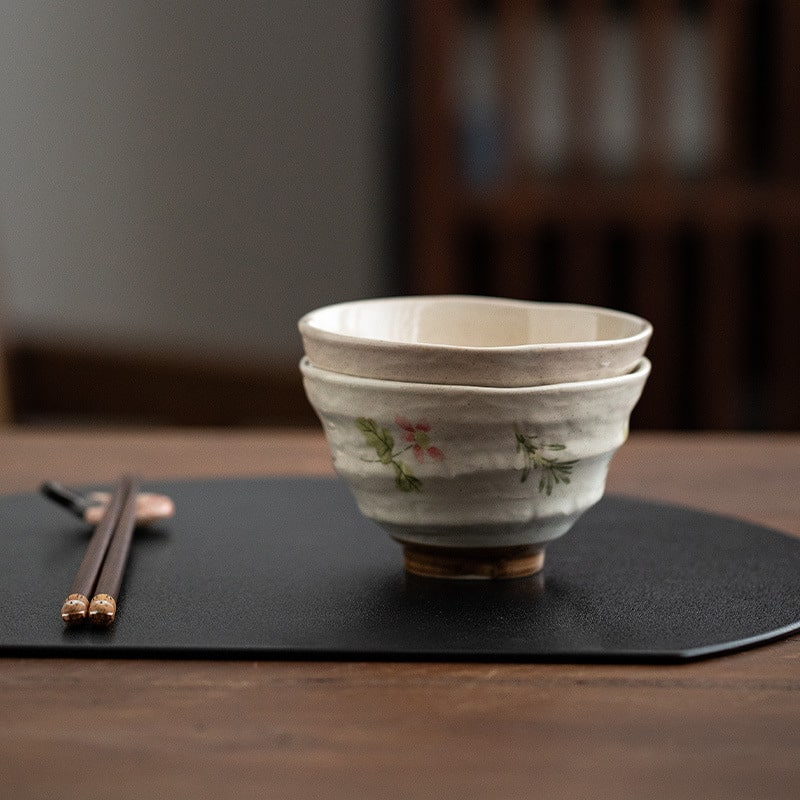 Close-up of a handcrafted ceramic bowl held in hands