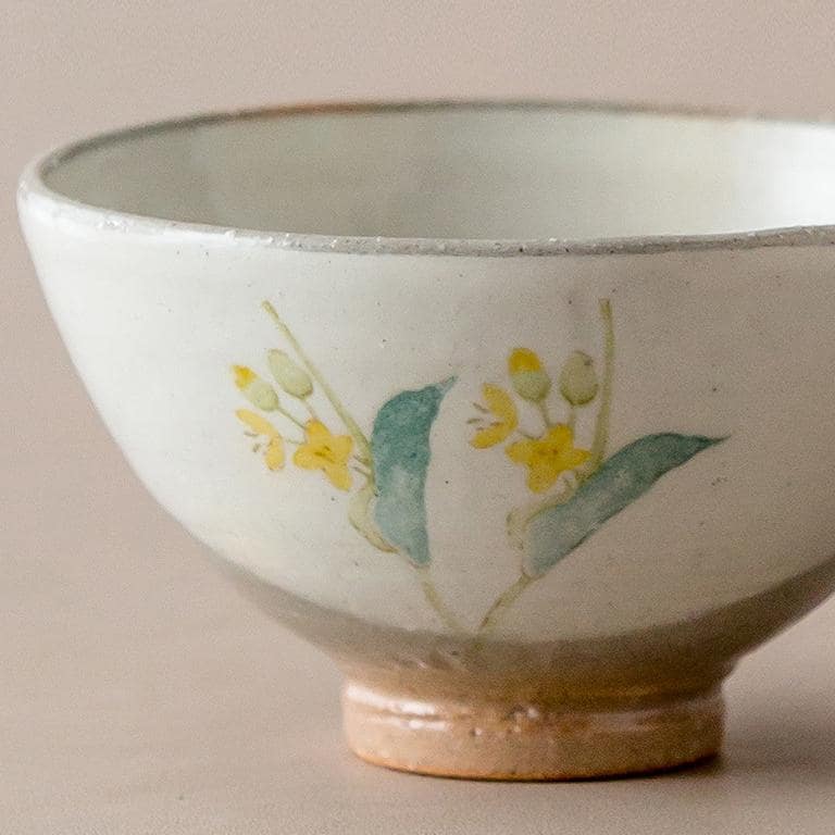 Five floral ceramic bowls displayed with wooden box packaging