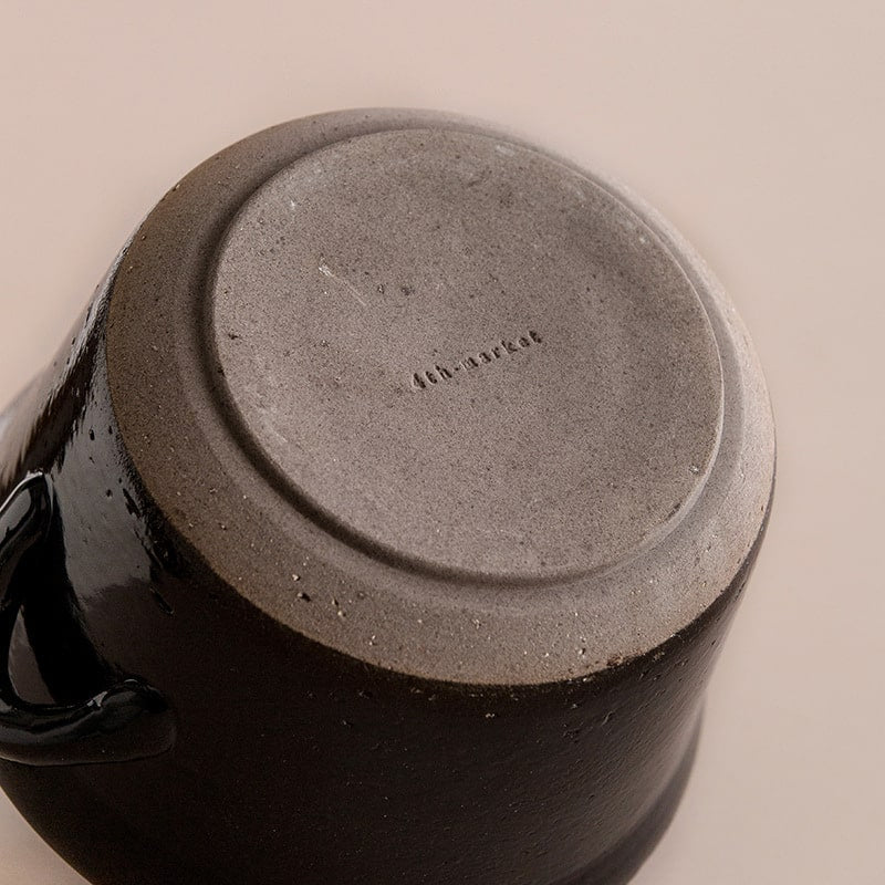 Durable ceramic pot for cooking and serving.