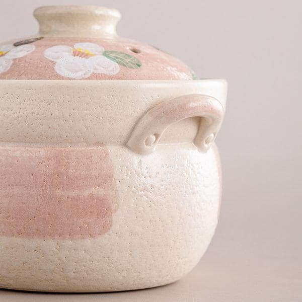 Close-up of double-ear handles on a Japanese earthenware pot