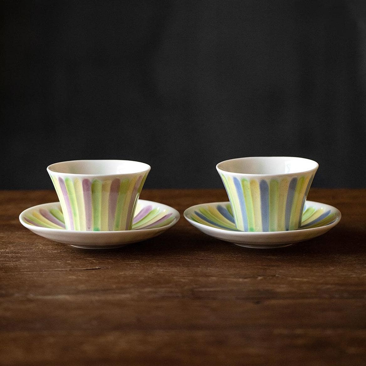 Delicate green floral ceramic tea cup pair