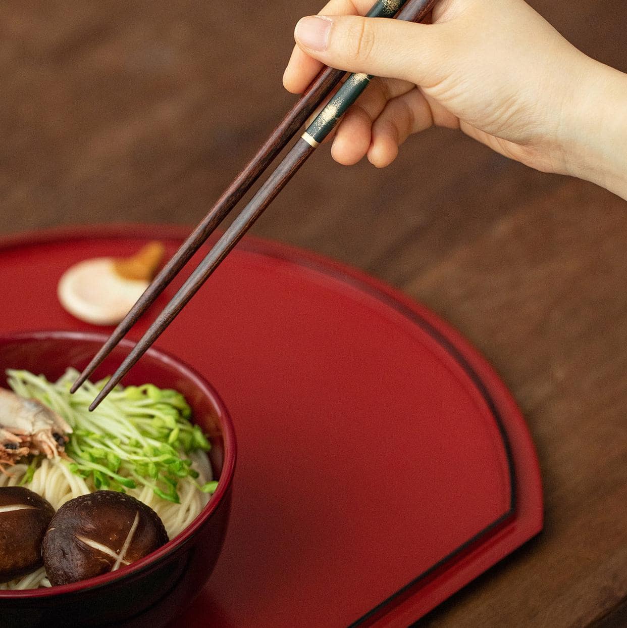 Elegant chopstick set displayed on modern tableware