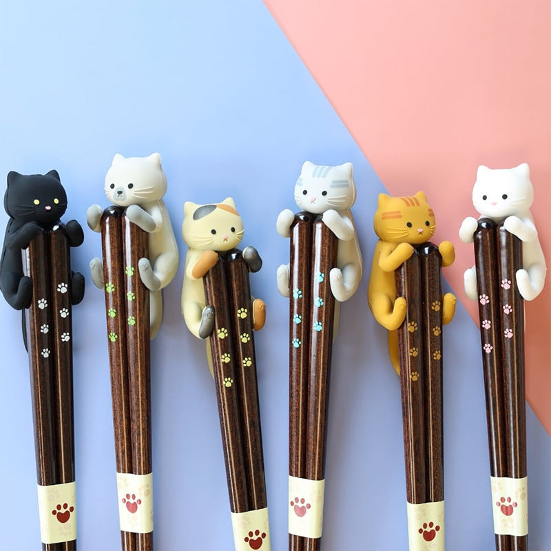 Close-up of paw print details on wooden chopsticks