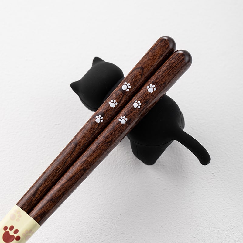 Cat-themed wooden chopsticks with paw prints