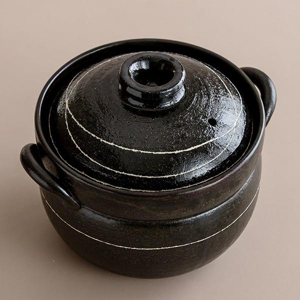 Close-up of double-ear handles on a Japanese earthenware pot