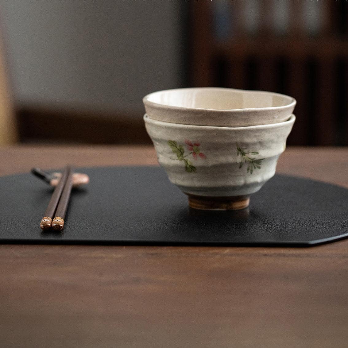 Hand-painted ceramic bowl with pink floral design