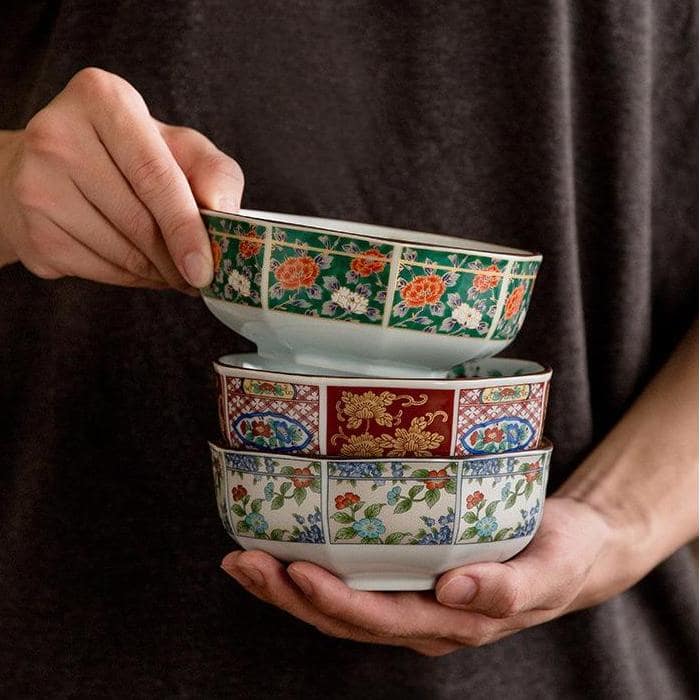 Set of five ceramic soup bowls with intricate Japanese designs.