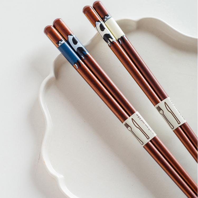 Set of decorative wooden chopsticks with cute motifs