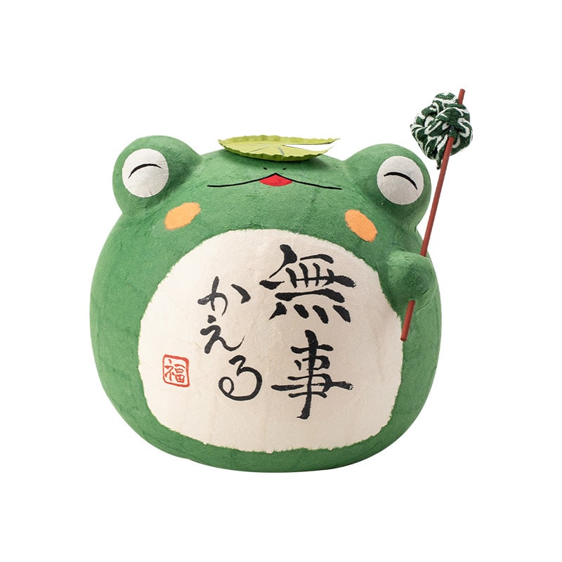 Whimsical green frog ceramic figurine with tiny companion frogs.