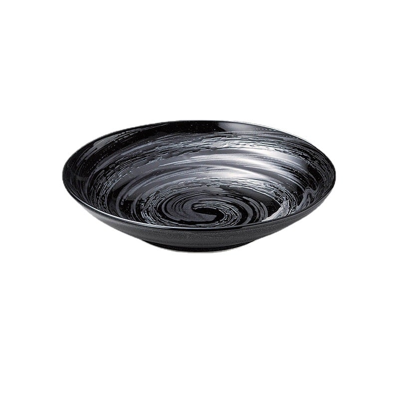 Black ceramic plate with elegant spiral design