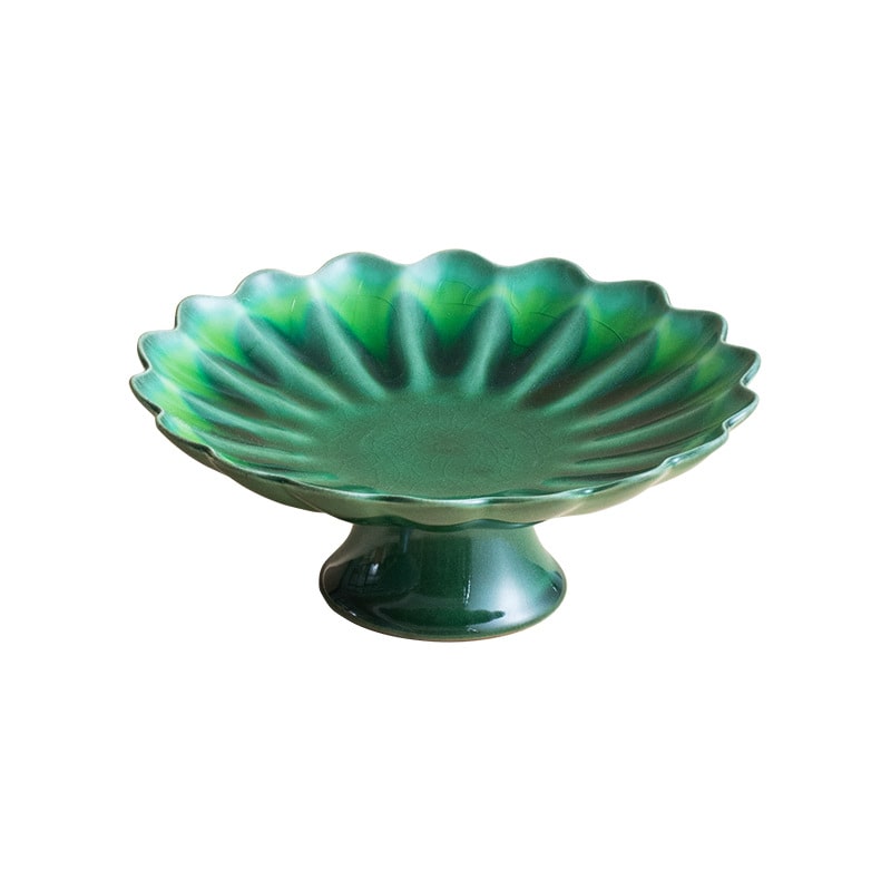 Japanese Mino glazed chrysanthemum-shaped dessert plate with vibrant blue glaze.