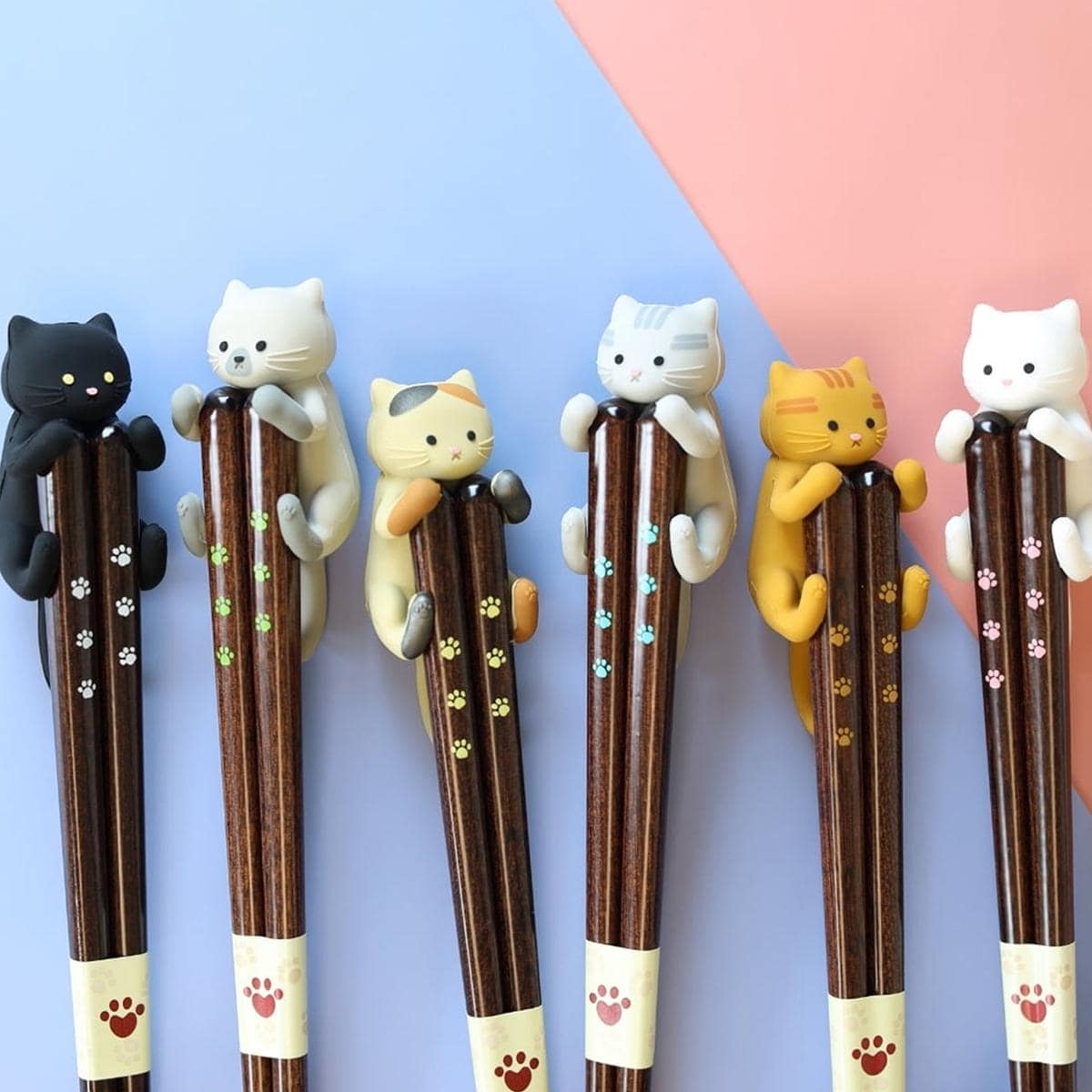 Cat-themed wooden chopsticks with paw prints