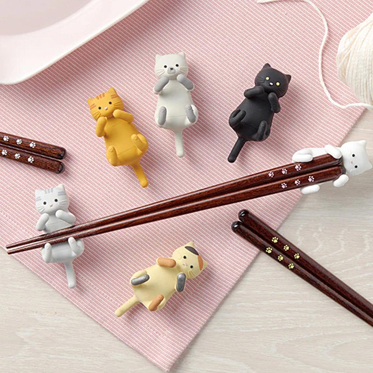 Close-up of paw print details on wooden chopsticks