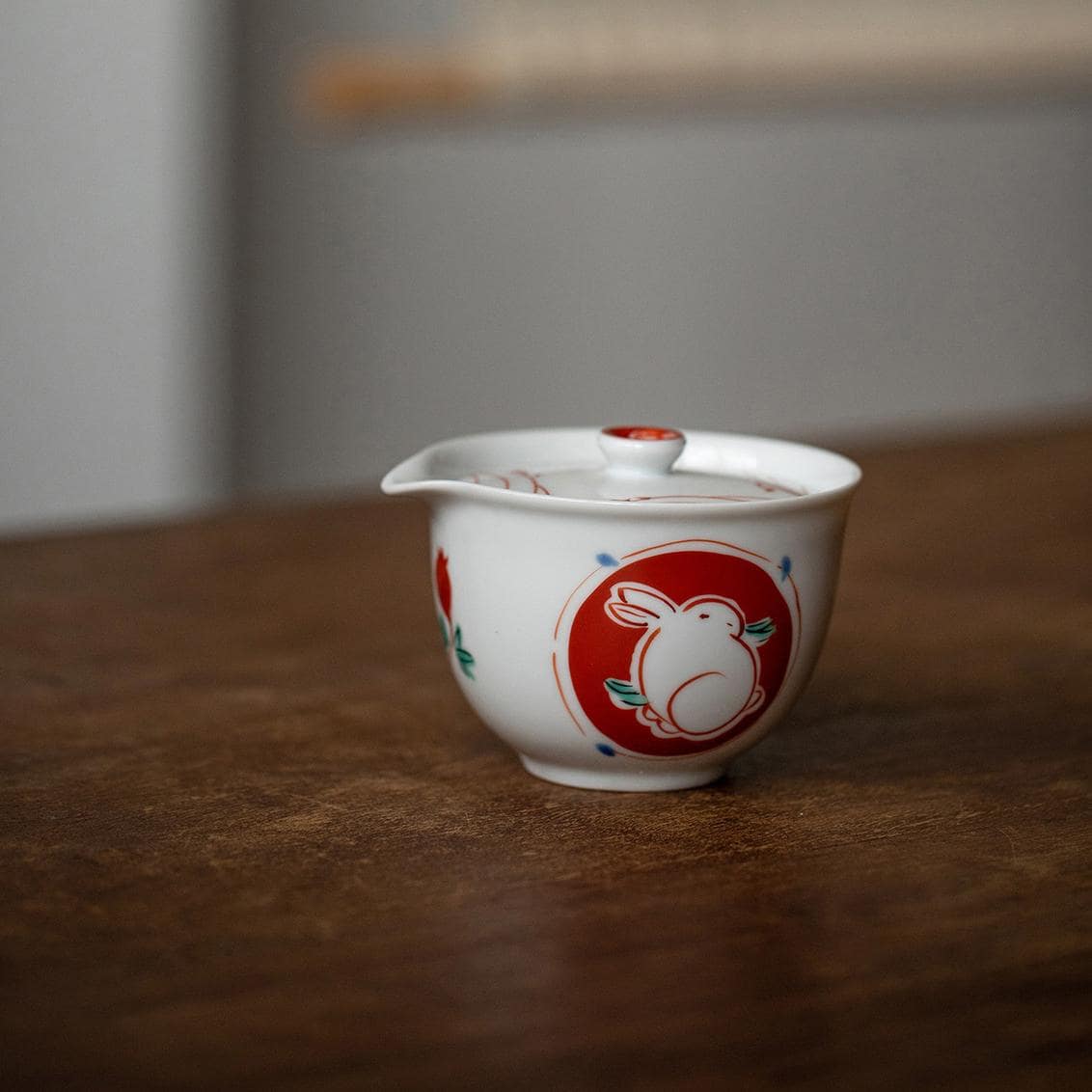 Elegant Rabbit Design Porcelain Teacup Set on wooden table