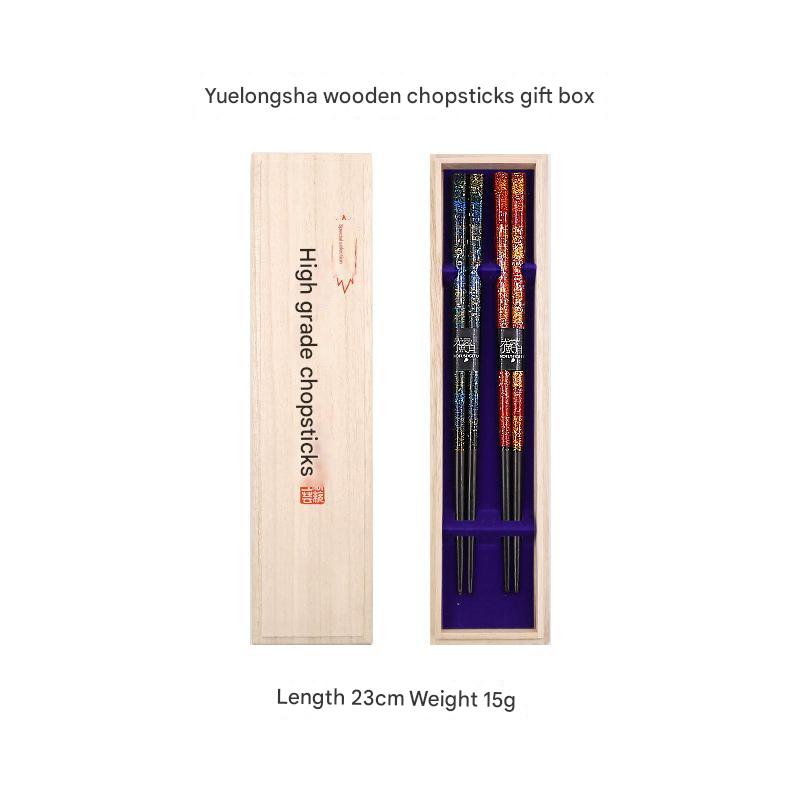 Handcrafted wooden chopsticks with red and blue lacquer finish