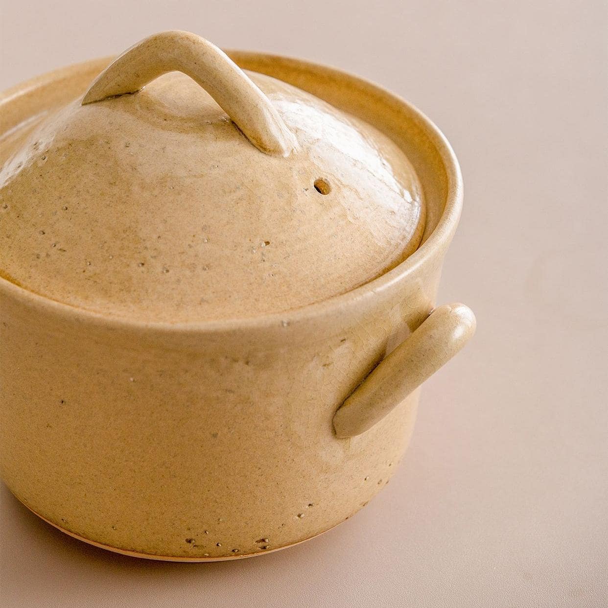 Neutral-tone stoneware casserole for modern kitchens.